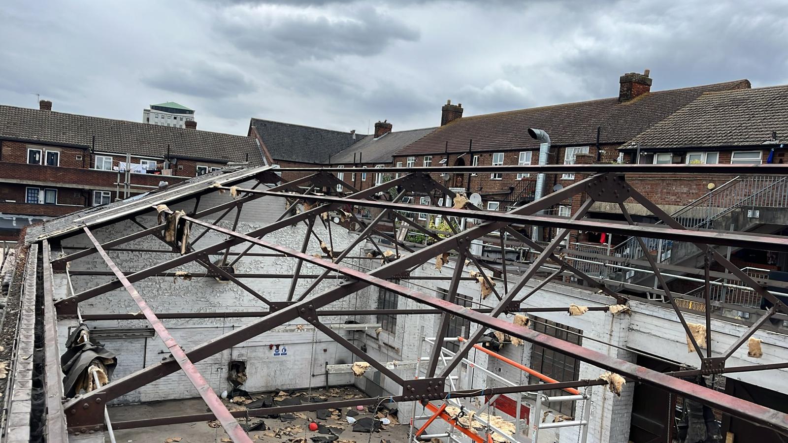 Completed metal roof after asbestos removal on a commercial property
